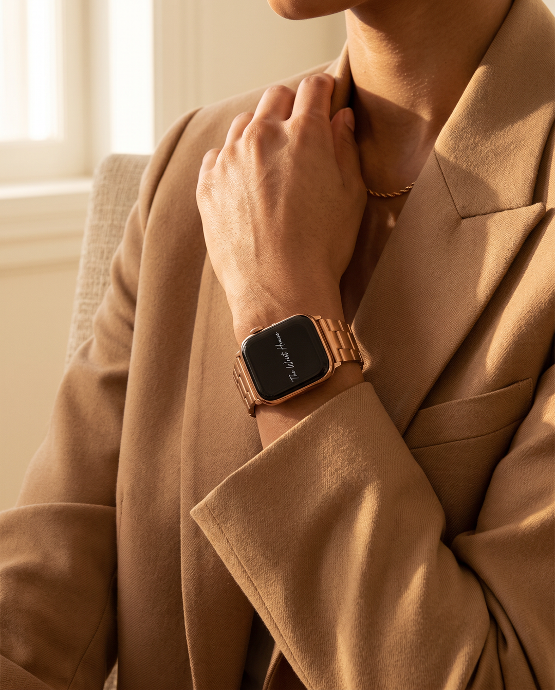 Classic link band for Apple Watch styled with a camel blazer