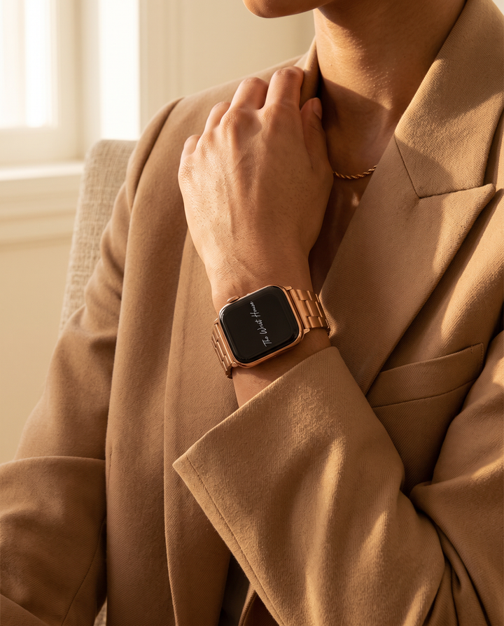 Classic link band for Apple Watch styled with a camel blazer