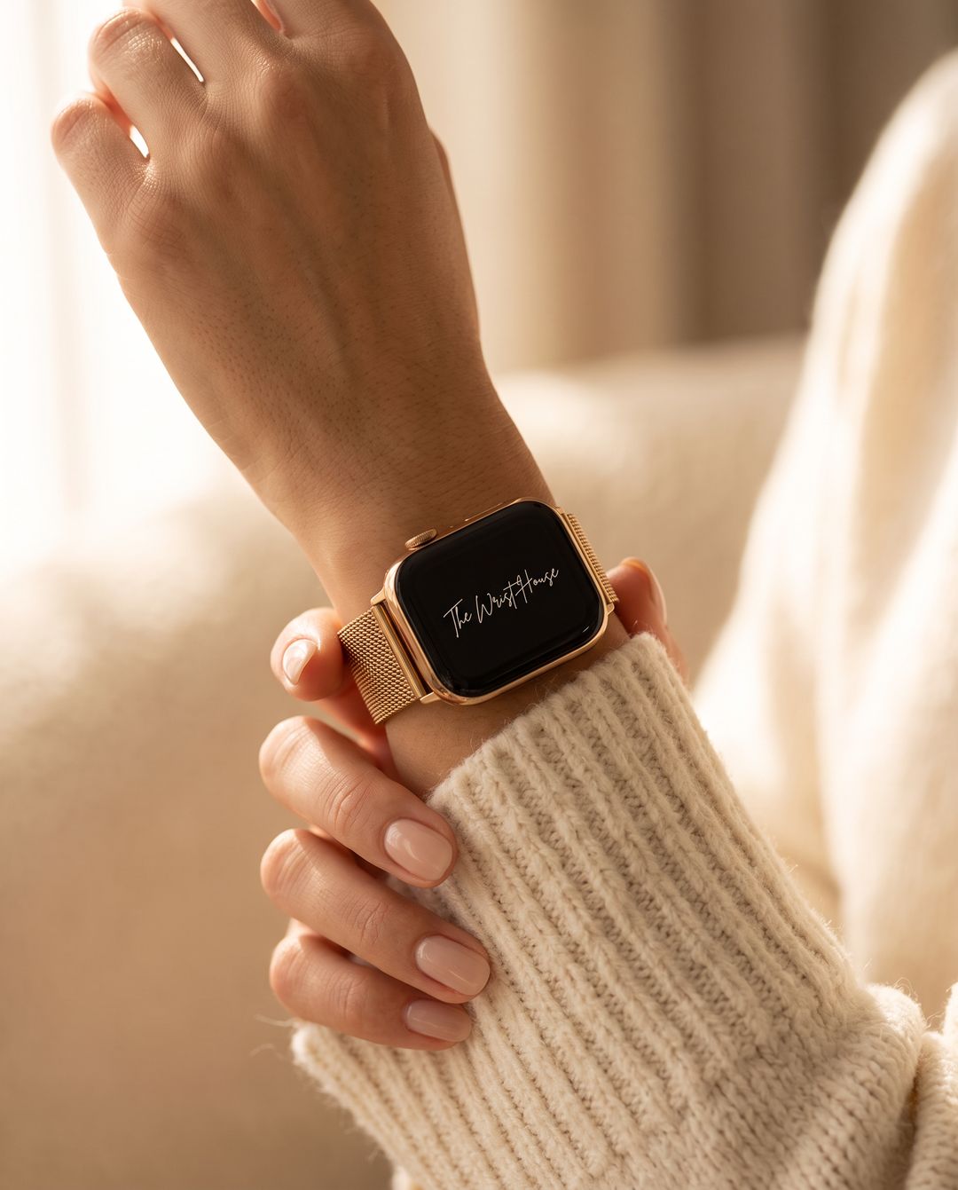 Milanese mesh Apple Watch band worn on a woman's wrist